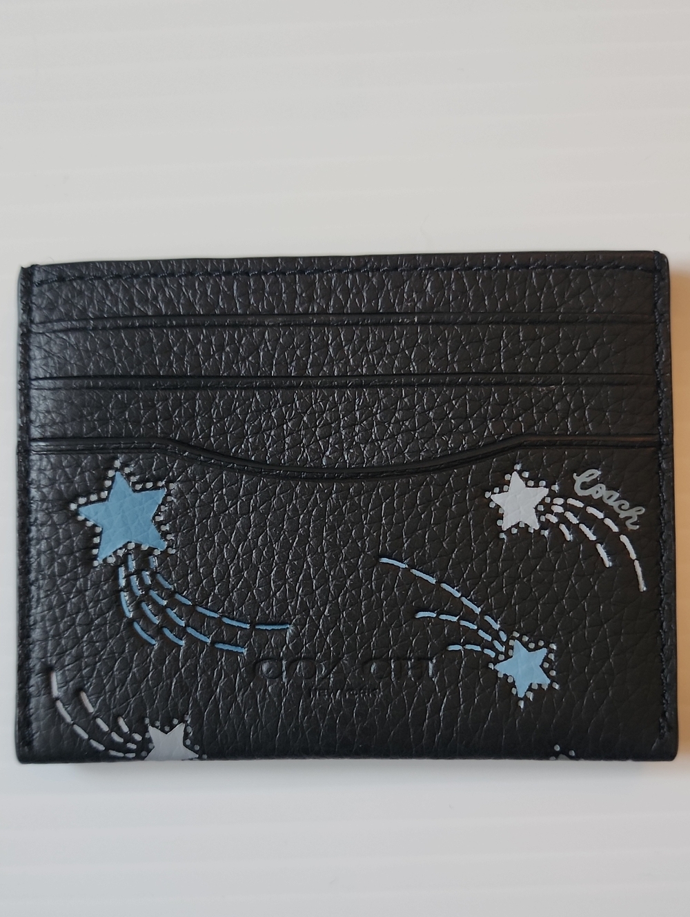 Coach Black Leather Star-Print Card Holder with Blue & White Accents. 4×3